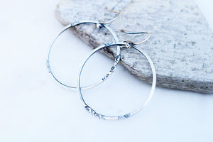 minimalist jewelry. all silver hoops. Silver hoop earrings. 