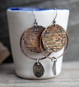 Handmade bohemain style, mixed metal hoop earrings. 