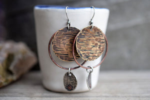 Handmade bohemain style, mixed metal hoop earrings.