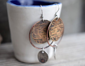 Handmade bohemain style, mixed metal hoop earrings.