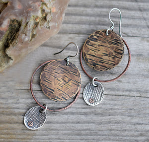 Handmade bohemain style, mixed metal hoop earrings.